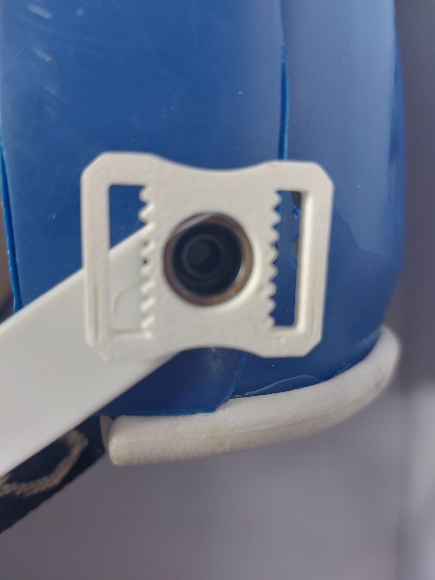 Hurling helmet strap clips